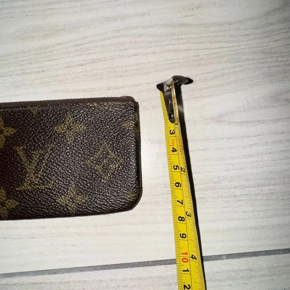 Louis Vuitton Monogram coin purse keychain  with an Entrupy Certificate of Authe